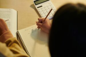 Schoolgirl Solving Equations